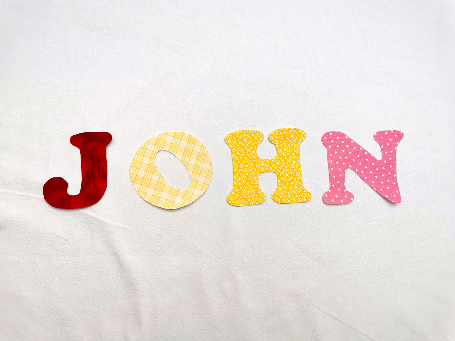 Appliqued name John