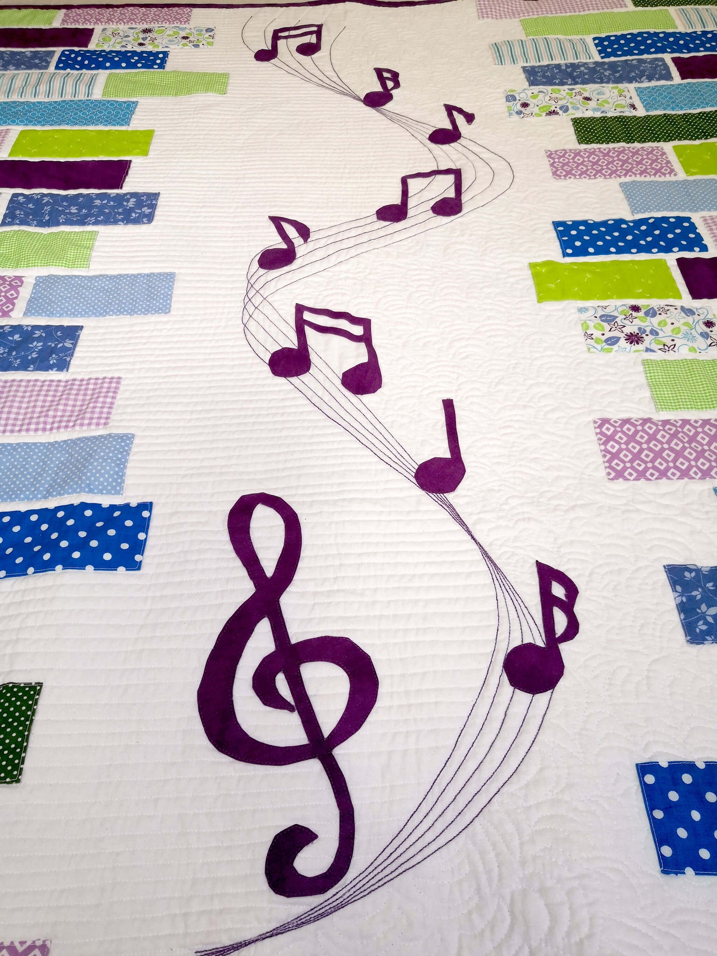 Stave and music note applique on the "Sound of Music" quilt