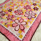 Cute baby girl quilt with flower applique