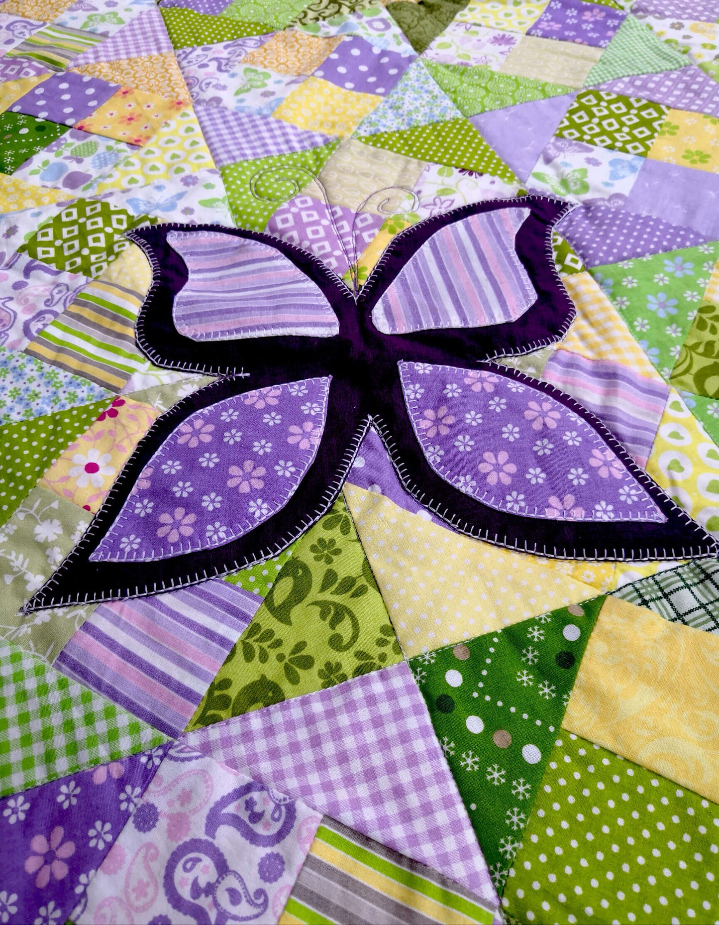 :Large butterfly appliqued on the patchworkwork