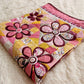 Pink yellow quilt with flowers for a girl