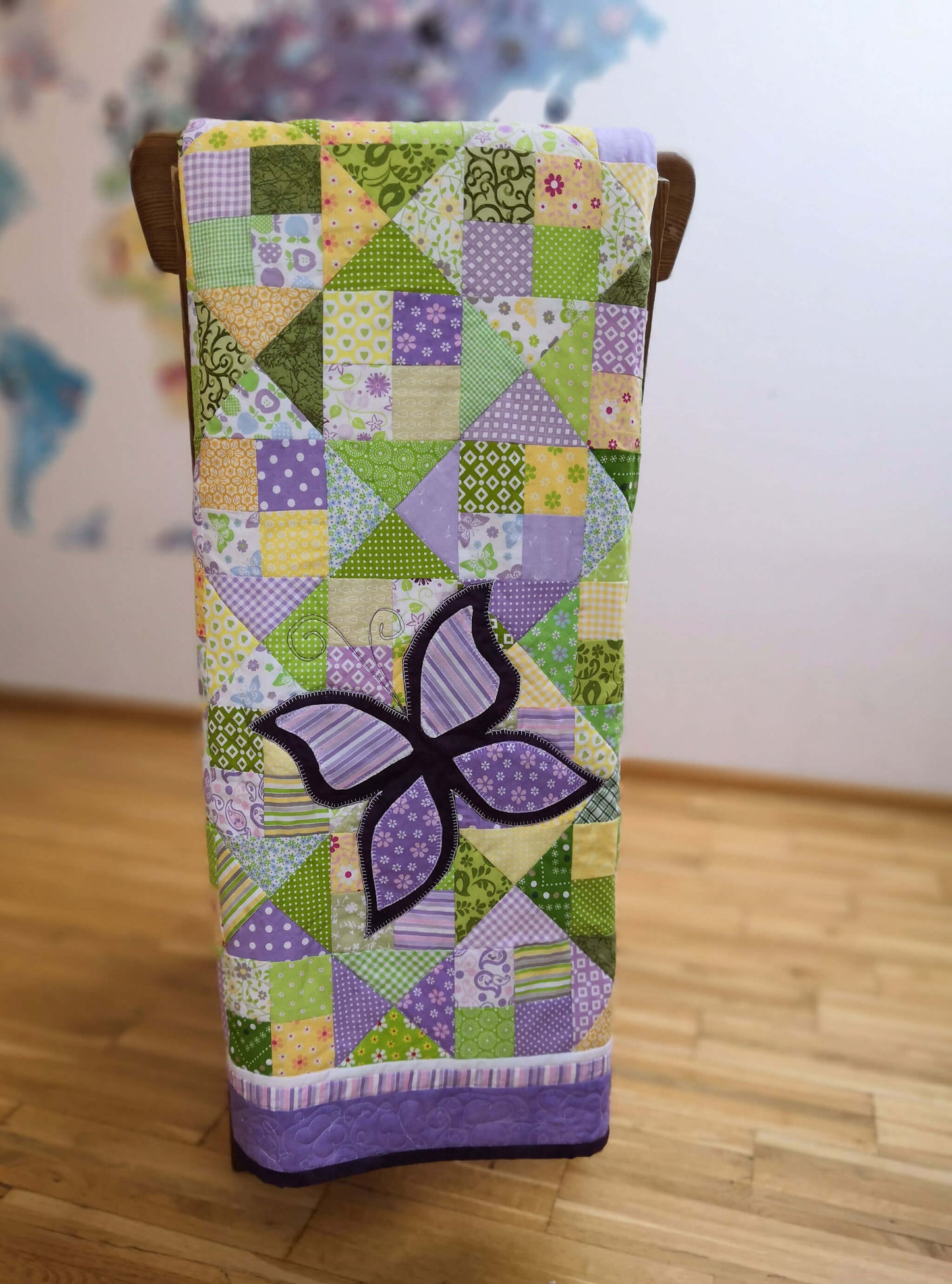 Girl's quilt with butterfly applique