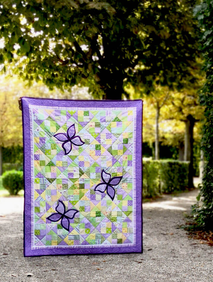 Sweet purple quilt for girls with butterflies